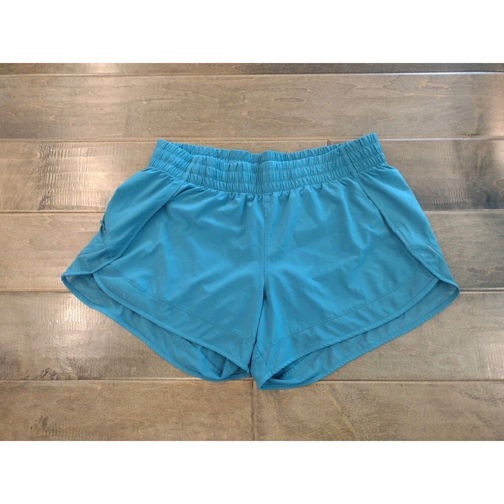 ATHLETA Women's teal green-blue Racer Run mesh 4" athletic shorts - M